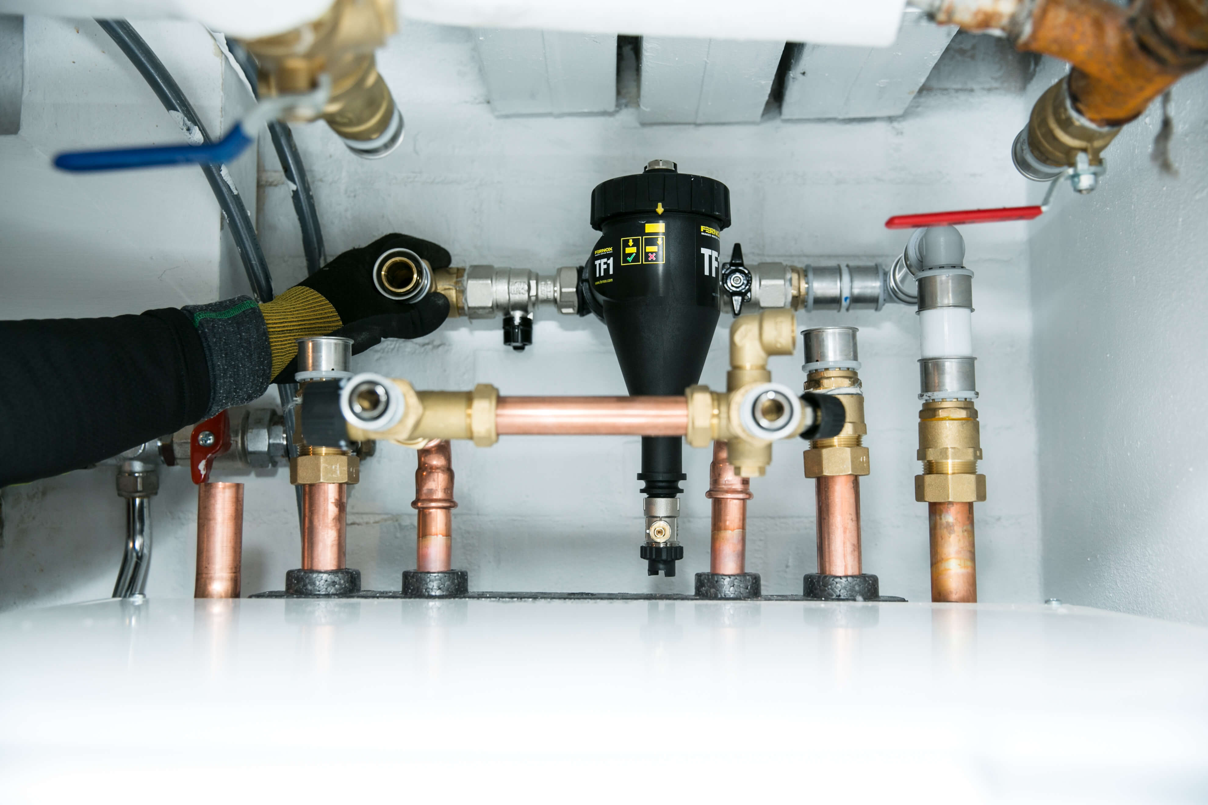 Installasjon av et magnetittfilter i et vannbårent varmeanlegg